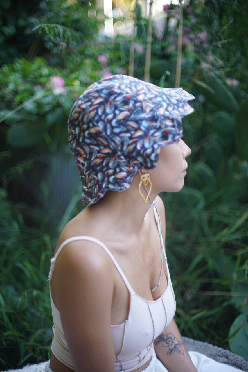 Dawn Sharp Muscles Seashells Petal Bonnet on Nia