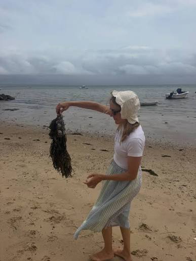 Chloe Sevigny in the Dawn Sharp Little House Petal Bonnet at the beach in Massachusetts 